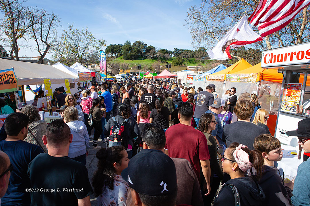 Image of crowd moving through vendor booths at Atascadero Tamale Festival 2019 - Photo by George L. Westlund